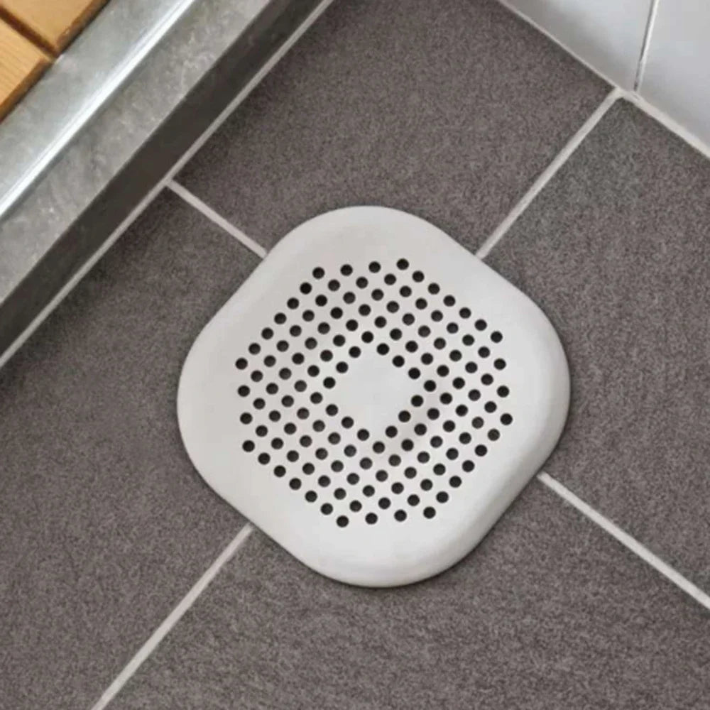 Square silicone absorbent drain for drains, kitchens, bathrooms and showers to prevent sinks from clogging the drain